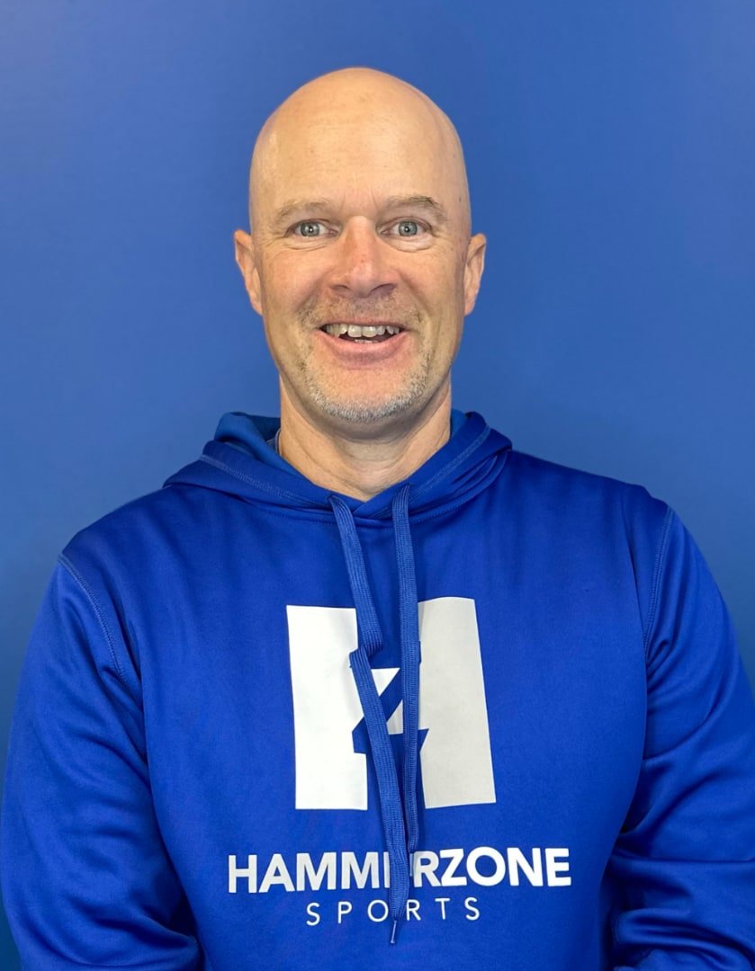 Greg Crawford in a HammerZone Sports hoodie — Baseball Instructor